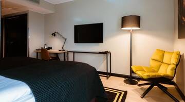 Фото номера Стандартный двухместный номер с 1 кроватью Отель Clarion Hotel Aviapolis г. Вантаа 5
