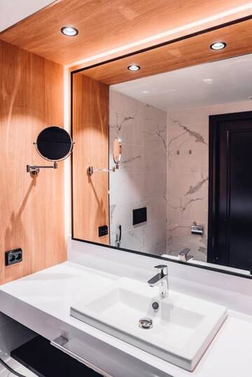 Фото номера Стандартный двухместный номер с 1 кроватью Отель Clarion Hotel Aviapolis г. Вантаа 12