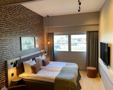Фото номера Двухместный номер бизнес-класса с 1 кроватью Отель Skyline Airport Hotel г. Вантаа 6