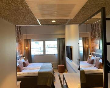 Фото номера Двухместный номер бизнес-класса с 1 кроватью Отель Skyline Airport Hotel г. Вантаа 4
