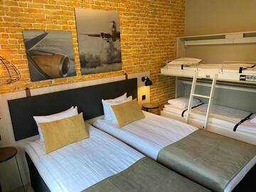 Фото номера Семейный номер эконом-класса Отель Skyline Airport Hotel г. Вантаа 4