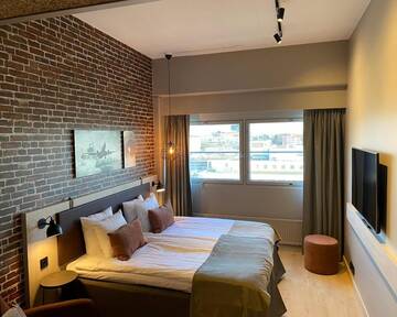 Фото номера Двухместный номер бизнес-класса с 1 кроватью Отель Skyline Airport Hotel г. Вантаа 3